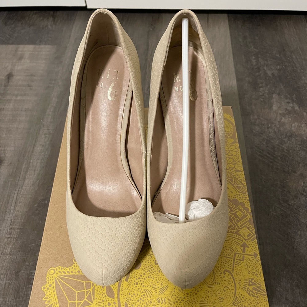 Bone colored platform pumps